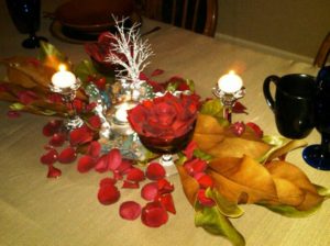Holiday Centerpiece with Roses and Magnolia Leaves